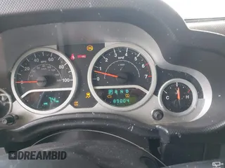 2010 Jeep Wrangler Unlimited Sport with VIN 1J4BA3H18AL161243, listed as a IAAI auction lot 41960370 with 89,004 mi miles. Bid and sale history available at carsss.com. Image 7.