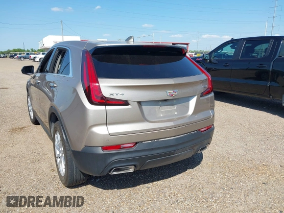 2023 Cadillac XT4 FWD Luxury with VIN 1GYAZAR4XPF116698, listed as a IAAI auction lot 40594015 with 18,368 mi miles. Bid and sale history available at carsss.com. Image 3.