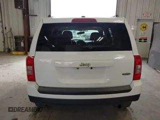 2014 Jeep Patriot Latitude with VIN 1C4NJPFA0ED680509, listed as a IAAI auction lot 41801775 with 147,418 mi miles and . Bid and sale history available at carsss.com. Image 16.