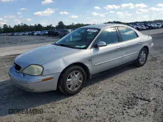 2003 Mercury Sable LS with VIN 1MEHM55S73A619013, listed as a Copart auction lot 73504154 with 200,135 mi miles and Salvage Title. Bid and sale history available at DreamBid. Image 1.