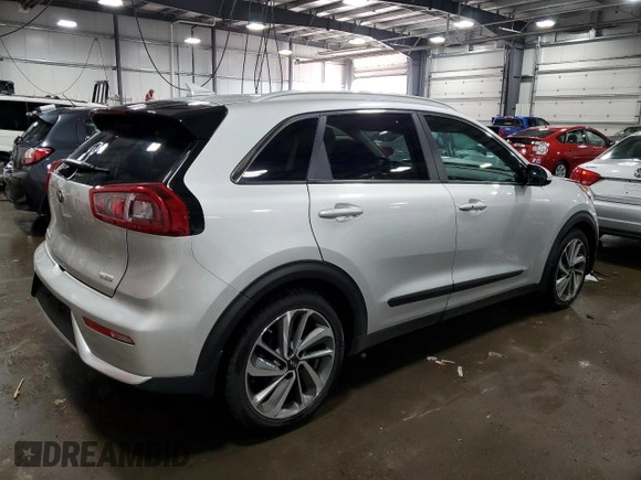 2017 Kia Niro Touring with VIN KNDCE3LC3H5094332, listed as a Copart auction lot 47012995 with 115,257 mi miles and Salvage Title. Bid and sale history available at carsss.com. Image 3.
