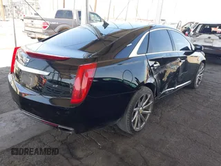 2013 Cadillac XTS Luxury with VIN 2G61P5S35D9105460, listed as a IAAI auction lot 42582313 with 144,895 mi miles and . Bid and sale history available at DreamBid. Image 4.