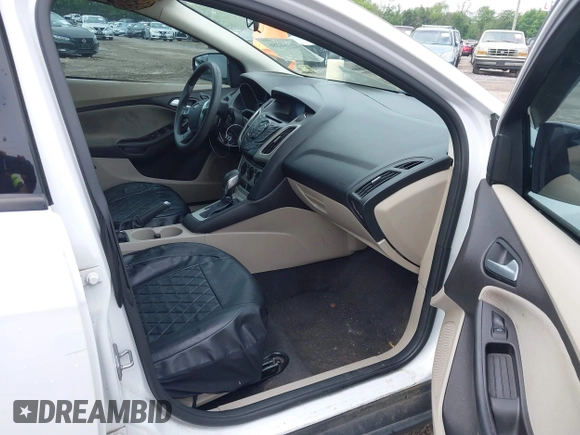 2013 Ford Focus SE z VIN 1FADP3F29DL372289, wystawiony jako IAAI lot #42364286 z przebiegiem 201 091 mil mil oraz . Historia ofert i sprzedaży dostępna na DreamBid. Obrazek 5.