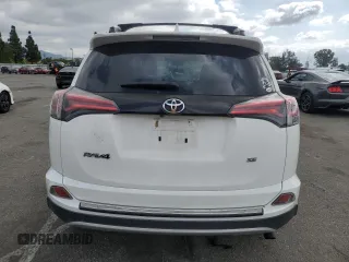2016 Toyota RAV4 SE with VIN 2T3NFREV4GW263191, listed as a Copart auction lot 54722135 with Not provided miles and Salvage title. Bid and sale history available at DreamBid. Image 6.