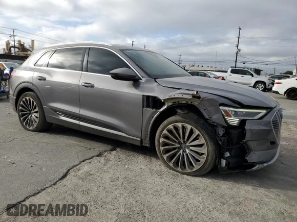 2019 Audi e-tron Prestige with VIN WA1VABGE6KB013000, listed as a Copart auction lot 46866995 with 54,469 mi miles and Salvage Title. Bid and sale history available at carsss.com. Image 4.