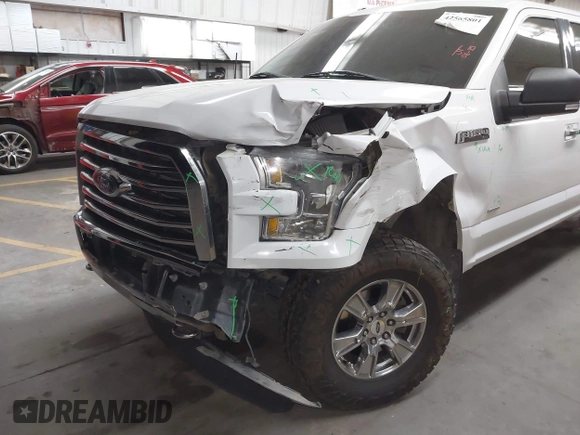 2015 Ford F-150 XLT with VIN 1FTEW1EGXFFB84269, listed as a IAAI auction lot 42565801 with 140,719 mi miles and . Bid and sale history available at DreamBid. Image 6.