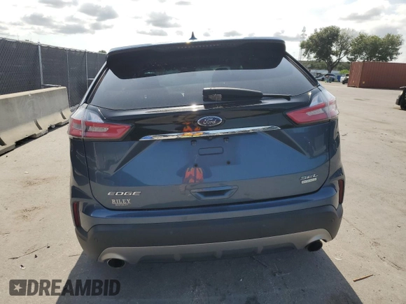 2019 Ford Edge SEL z VIN 2FMPK3J9XKBB10221, wystawiony jako Copart lot #61335815 z przebiegiem 93 444 mil mil oraz Nie do naprawy • Non repairable. Historia ofert i sprzedaży dostępna na DreamBid. Obrazek 6.