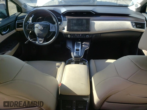 2018 Honda Clarity Touring z VIN JHMZC5F33JC002904, wystawiony jako Copart lot #55535325 z przebiegiem Nie podano mil oraz Szkoda całkowita • Salvage title. Historia ofert i sprzedaży dostępna na DreamBid. Obrazek 8.