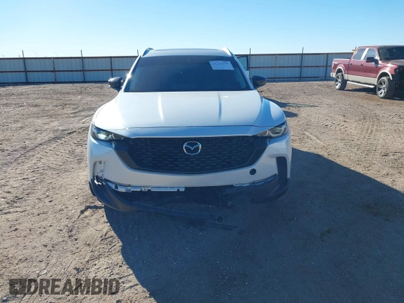 2024 Mazda CX-50 Premium z VIN 7MMVABDY0RN186511, wystawiony jako IAAI lot #41229255 z przebiegiem 21 842 mil mil oraz . Historia ofert i sprzedaży dostępna na DreamBid. Obrazek 12.