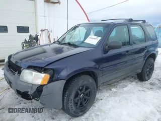 2003 Ford Escape XLS Popular with VIN 1FMYU92153KE01890, listed as a IAAI auction lot 41605087 with 109,411 mi miles. Bid and sale history available at carsss.com. Image 19.