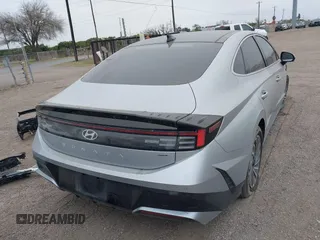 2024 Hyundai Sonata Hybrid Limited with VIN KMHL54JJ1RA087584, listed as a IAAI auction lot 41615405 with 18,684 mi miles. Bid and sale history available at carsss.com. Image 4.
