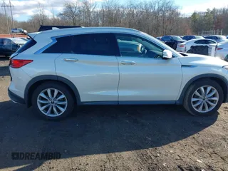 2019 Infiniti QX50 Luxe with VIN 3PCAJ5M3XKF111873, listed as a IAAI auction lot 41499218 with 37,383 mi miles and . Bid and sale history available at DreamBid. Image 13.