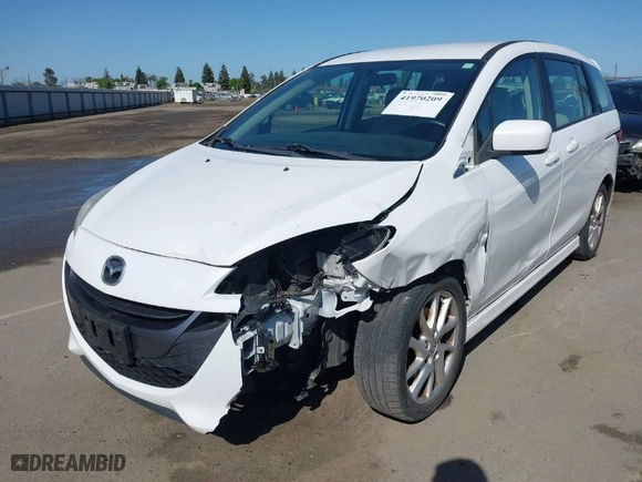 2012 Mazda Mazda5 Touring with VIN JM1CW2CL7C0140452, listed as a IAAI auction lot 41970209 with 92,069 mi miles. Bid and sale history available at carsss.com. Image 2.