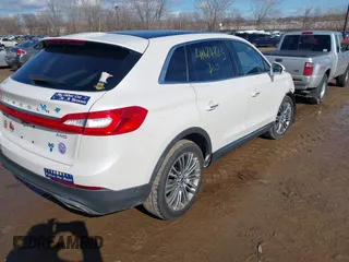 2016 Lincoln MKX Reserve with VIN 2LMTJ8LR4GBL44989, listed as a IAAI auction lot 41684823 with 101,528 mi miles. Bid and sale history available at carsss.com. Image 4.