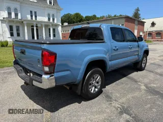 2019 Toyota Tacoma SR with VIN 3TMCZ5AN8KM272578, listed as a Copart auction lot 63283405 with 79,569 mi miles and Clean title. Bid and sale history available at DreamBid. Image 4.