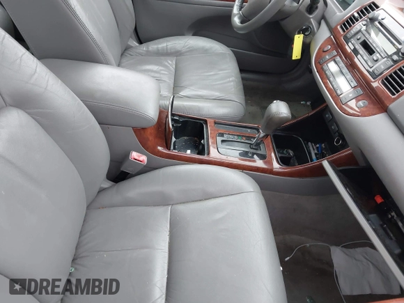 2003 Toyota Camry LE with VIN 4T1BE30K13U144114, listed as a IAAI auction lot 41829879 with 60,385 mi miles and . Bid and sale history available at DreamBid. Image 5.