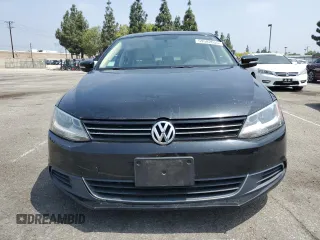 2013 Volkswagen Jetta SE with VIN 3VWDX7AJ6DM438180, listed as a Copart auction lot 59582655 with 106,082 mi miles and Salvage title. Bid and sale history available at DreamBid. Image 5.