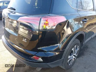 2017 Toyota RAV4 LE z VIN 2T3BFREV6HW543909, wystawiony jako IAAI lot #41668964 z przebiegiem 102 452 mil mil oraz . Historia ofert i sprzedaży dostępna na DreamBid. Obrazek 21.