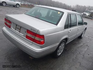 1998 Volvo S90 with VIN YV1KS9600W1129240, listed as a IAAI auction lot 41564419 with 131,225 mi miles. Bid and sale history available at carsss.com. Image 4.