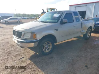 1998 Ford F-150 XL with VIN 1FTRX07L1WKA76665, listed as a IAAI auction lot 41863626 with 30,654 mi miles. Bid and sale history available at carsss.com. Image 2.