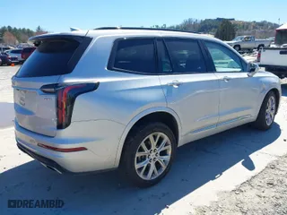 2020 Cadillac XT6 AWD Sport with VIN 1GYKPGRS8LZ101542, listed as a IAAI auction lot 41817075 with 58,113 mi miles. Bid and sale history available at carsss.com. Image 4.