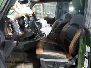 2023 Ford Bronco z VIN 1FMDE5BH3PLB47307, wystawiony jako Copart lot #56156495 z przebiegiem 16 178 mil mil oraz Szkody całkowita. Historia ofert i sprzedaży dostępna na DreamBid. Obrazek 7.