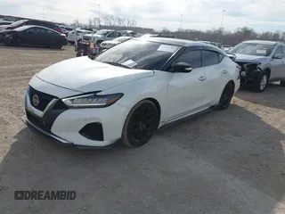 2019 Nissan Maxima SV with VIN 1N4AA6AV7KC383974, listed as a IAAI auction lot 41660286 with 86,682 mi miles and . Bid and sale history available at DreamBid. Image 17.