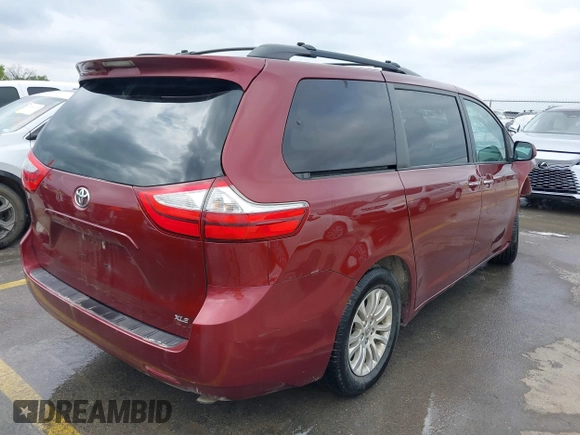 2015 Toyota Sienna XLE with VIN 5TDYK3DC0FS565597, listed as a IAAI auction lot 42062160 with 181,543 mi miles. Bid and sale history available at carsss.com. Image 4.