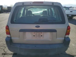 2007 Ford Escape XLS with VIN 1FMYU02Z77KB76668, listed as a Copart auction lot 73338784 with 166,759 mi miles and Salvage Title. Bid and sale history available at carsss.com. Image 6.