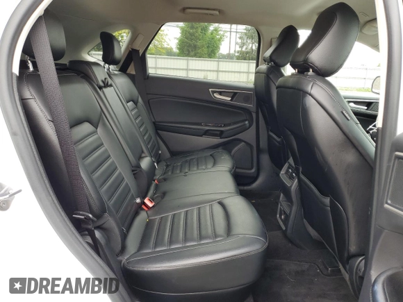 2020 Ford Edge SEL z VIN 2FMPK3J90LBB01559, wystawiony jako Copart lot #61365305 z przebiegiem 120 050 mil mil oraz Czysty tytuł • Clean title. Historia ofert i sprzedaży dostępna na DreamBid. Obrazek 11.