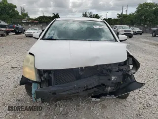 2009 Nissan Sentra SR FE+ with VIN 3N1AB61EX9L658150, listed as a Copart auction lot 52736025 with 109,951 mi miles and Salvage title. Bid and sale history available at DreamBid. Image 5.