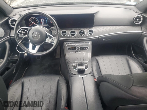 2019 Mercedes-Benz E 300 with VIN WDDZF4KB7KA553856, listed as a Copart auction lot 61025735 with 59,001 mi miles and Salvage title. Bid and sale history available at DreamBid. Image 8.