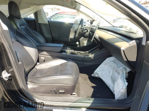 2018 Tesla Model 3 Long Range Battery with VIN 5YJ3E1EB9JF183920, listed as a IAAI auction lot 41657742 with 107,358 mi miles and . Bid and sale history available at DreamBid. Image 5.