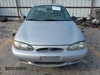 1999 Ford Escort SE z VIN 1FAFP13P6XW200107, wystawiony jako IAAI lot #42600719 z przebiegiem 113 515 mil mil oraz . Historia ofert i sprzedaży dostępna na DreamBid. Obrazek 12.