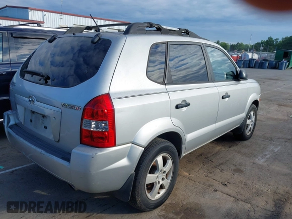 2006 Hyundai Tucson GL with VIN KM8JM12B26U469326, listed as a IAAI auction lot 42204742 with 240,998 mi miles. Bid and sale history available at carsss.com. Image 4.