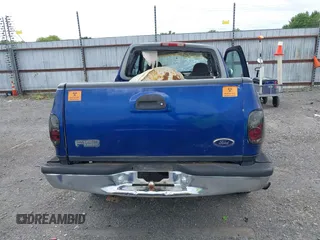 1998 Ford F-150 XL with VIN 2FTZX0722WCA65198, listed as a IAAI auction lot 42145451 with 188,529 mi miles and . Bid and sale history available at DreamBid. Image 14.