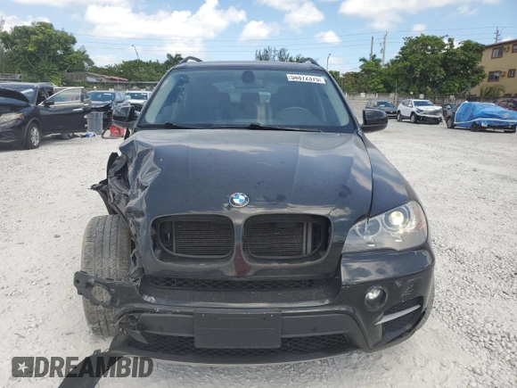 2013 BMW X5 xDrive35i z VIN 5UXZV4C58D0B21356, wystawiony jako Copart lot #54872375 z przebiegiem 113 825 mil mil oraz Szkoda całkowita • Salvage title. Historia ofert i sprzedaży dostępna na DreamBid. Obrazek 5.