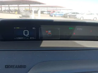 2022 Toyota Prius L Eco with VIN JTDKAMFUXN3181752, listed as a IAAI auction lot 42015717 with 129,637 mi miles and . Bid and sale history available at DreamBid. Image 7.