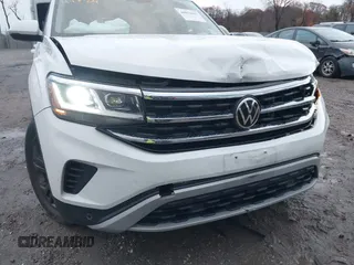 2022 Volkswagen Atlas SE z VIN 1V2KR2CA1NC555087, wystawiony jako IAAI lot #40921013 z przebiegiem 62 834 mil mil oraz . Historia ofert i sprzedaży dostępna na DreamBid. Obrazek 18.