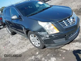 2015 Cadillac SRX Luxury Collection with VIN 3GYFNBE36FS537297, listed as a IAAI auction lot 41733421 with 147,336 mi miles. Bid and sale history available at carsss.com. Image 1.