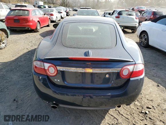 2009 Jaguar XK with VIN SAJWA43B995B30780, listed as a Copart auction lot 79119264 with 0 mi miles and Salvage Title. Bid and sale history available at carsss.com. Image 6.