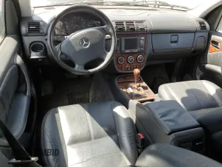 2004 Mercedes-Benz M-Class with VIN 4JGAB75EX4A470494, listed as a Copart auction lot 52024515 with 185,639 mi miles and Salvage Title. Bid and sale history available at carsss.com. Image 8.