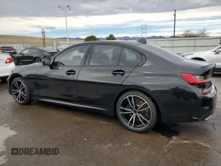 2020 BMW 3 Series M340i with VIN WBA5U7C04LFH57287, listed as a Copart auction lot 50228085 with 39,469 mi miles and Salvage Title. Bid and sale history available at carsss.com. Image 2.