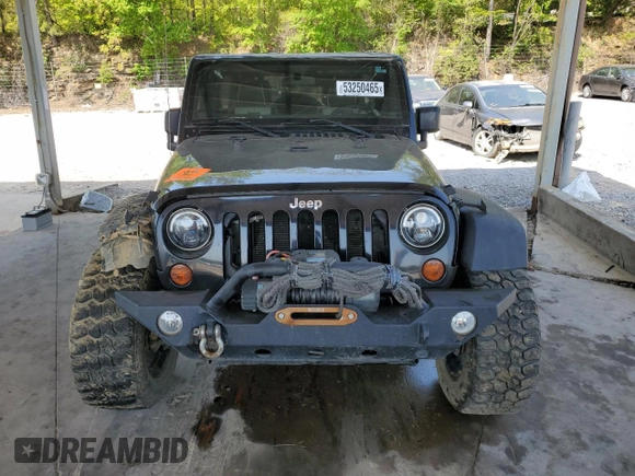 2011 Jeep Wrangler Unlimited Sport with VIN 1J4HA3H19BL574932, listed as a Copart auction lot 53250465 with 113,344 mi miles and Salvage Title. Bid and sale history available at carsss.com. Image 5.