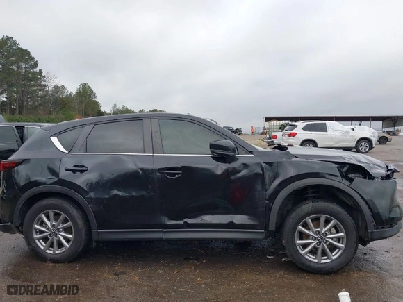 2022 Mazda CX-5 2.5 S Carbon Edition with VIN JM3KFBCM9N0579750, listed as a IAAI auction lot 41553088 with NaN miles. Bid and sale history available at carsss.com. Image 15.