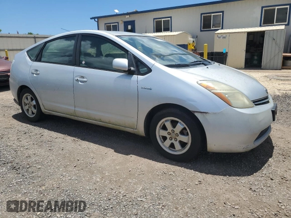 2006 Toyota Prius with VIN JTDKB22U167521985, listed as a Copart auction lot 54974335 with 128,541 mi miles and Clean Title. Bid and sale history available at carsss.com. Image 4.