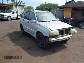 2002 Suzuki Grand Vitara z VIN JS3TE62VX24154173, wystawiony jako IAAI lot #41711181 z przebiegiem 224 024 mil mil oraz . Historia ofert i sprzedaży dostępna na DreamBid. Obrazek 1.