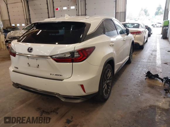 2016 Lexus RX 450h with VIN 2T2BGMCA1GC004487, listed as a IAAI auction lot 41830419 with 6,395 mi miles and . Bid and sale history available at DreamBid. Image 4.