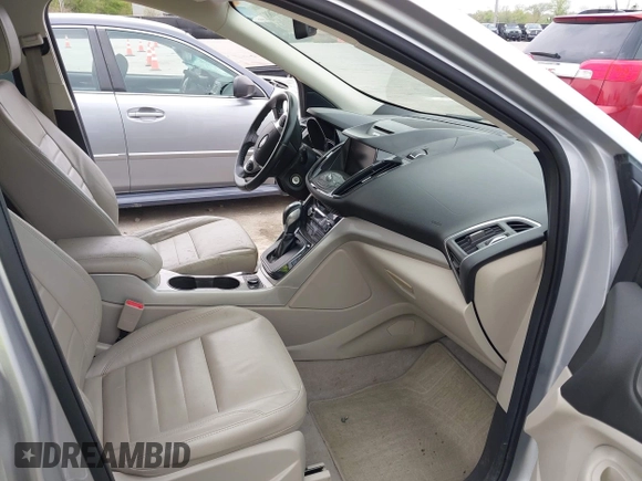 2013 Ford Escape SEL with VIN 1FMCU0HX1DUB81641, listed as a IAAI auction lot 42090788 with 111,496 mi miles and . Bid and sale history available at DreamBid. Image 5.