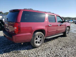 2007 Chevrolet Suburban LS with VIN 1GNFC16057J212547, listed as a Copart auction lot 48611455 with 257,188 mi miles and Salvage Title. Bid and sale history available at carsss.com. Image 3.